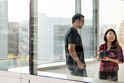 Photo of two students talking. Links to What to Give. whattogive.jpg